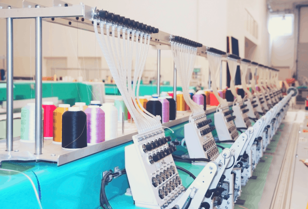 row of commercial embroidery machines